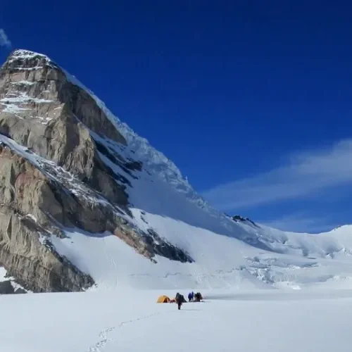 High-altitude camp on a Himalayan glacier under a starry sky